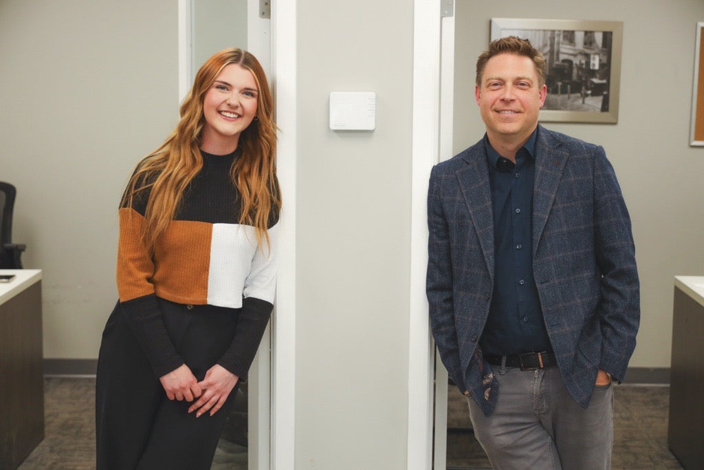 Two Jump Employees, Posing And Smiling In Jump Office