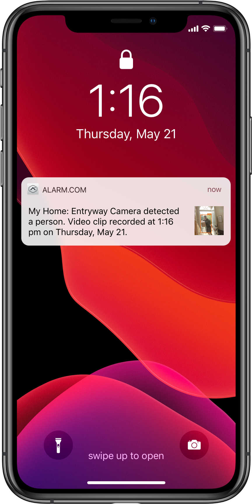 Smartphone screen showing a security notification that an entryway camera has detected a person with a timestamp and a thumbnail image of the event.