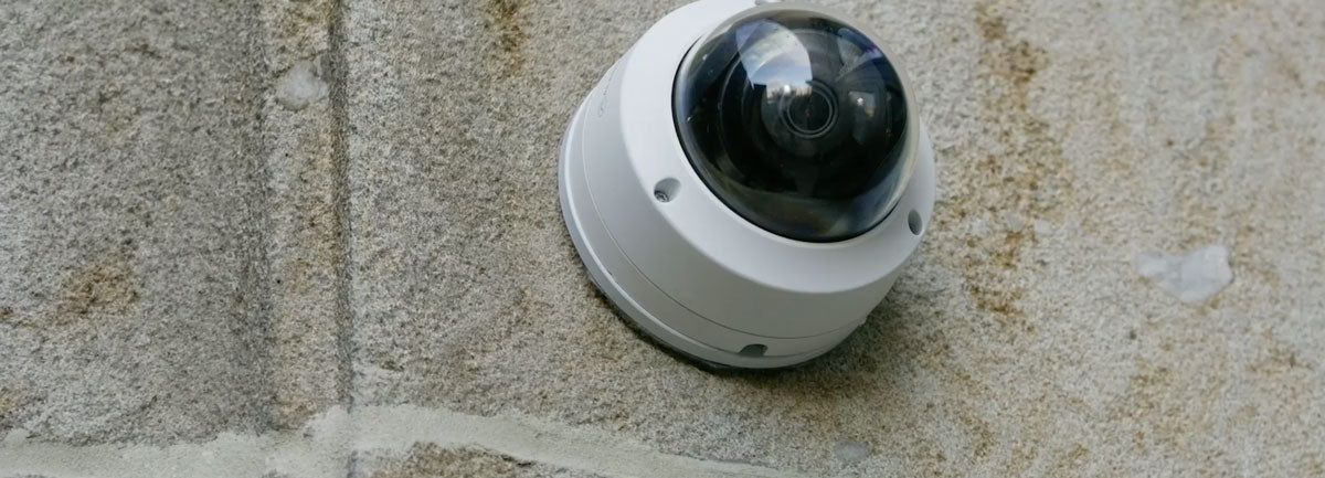 Security Camera On Stone Brick Wall